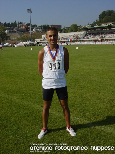 Salvatore-Lanuzza-Camp.-italiani-CSI_Reggio-Emila-Settembre-2004-Medaglia-Argento-nei-5000m
